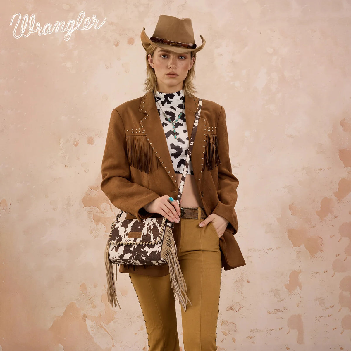 Wrangler® Cow Print Fringe Crossbody Bag WG-HB-444-1818CF